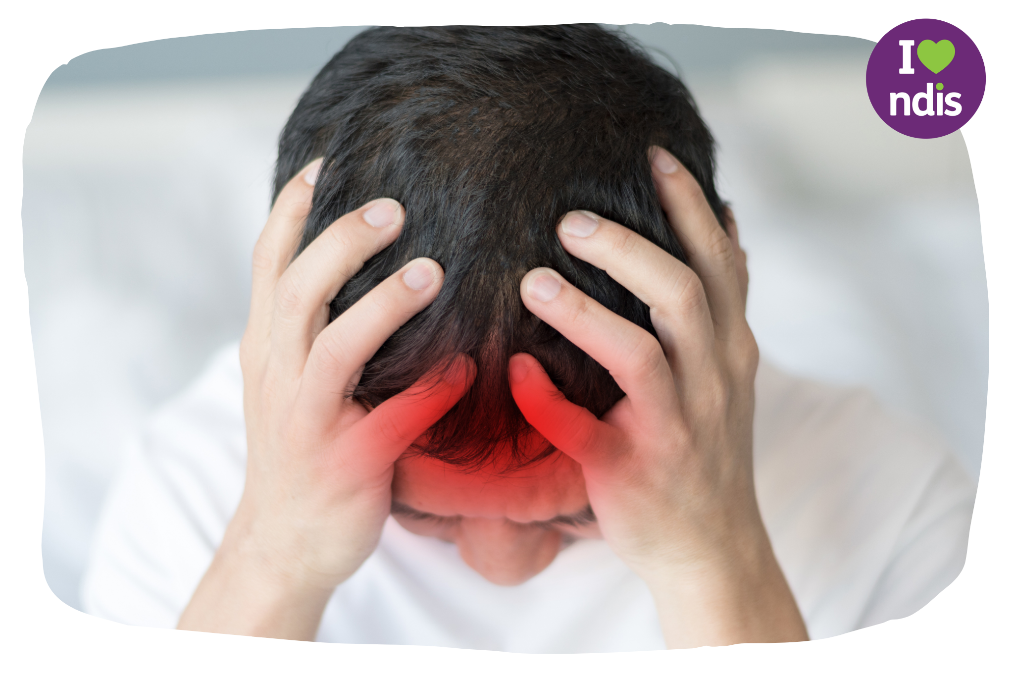 A picture of a boy holding his head with both hands and a red area suggests he has a pain in his head.